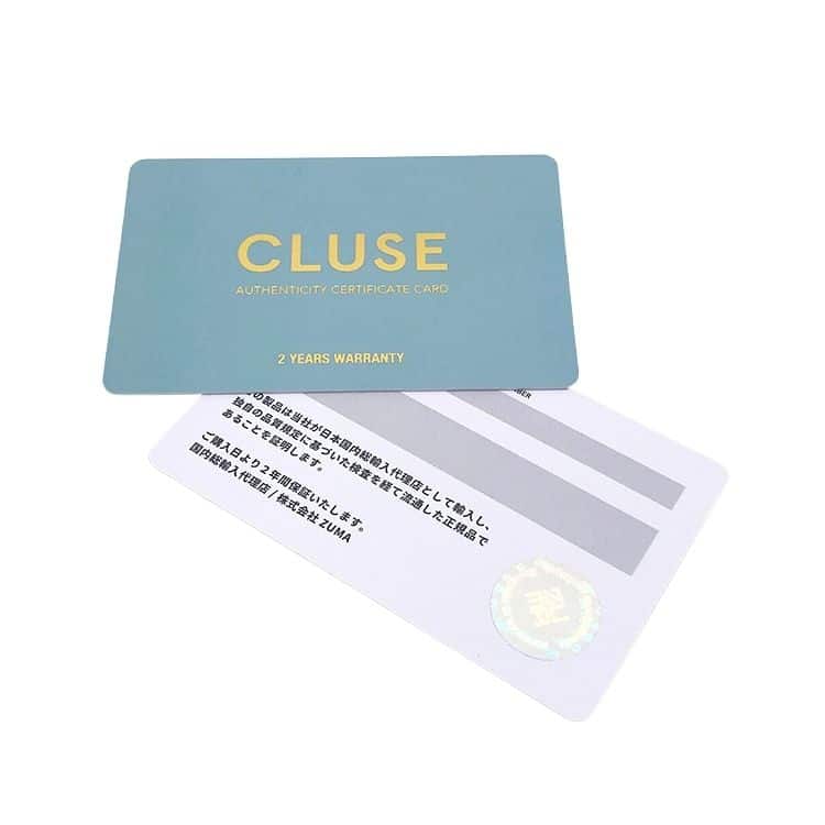 Plastic warranty card with gold foil and hologram label — custom card printing