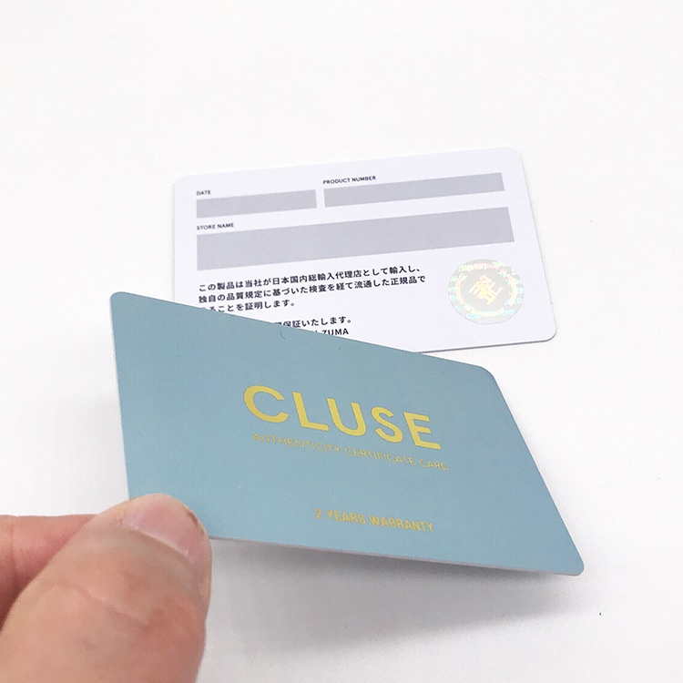 Plastic warranty card with gold foil and hologram label view 2