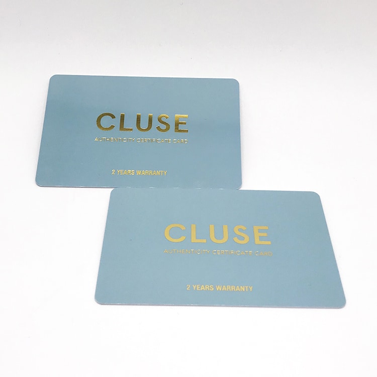 Plastic warranty card with gold foil and hologram label view 3